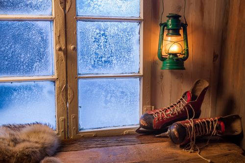 Warm cottage in a winter evening