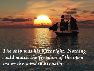 Ship out at sea at sunset.