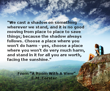 Young woman with backpack sitting on cliff and looking to a sky